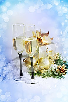 New Year and Christmas Celebration .Two Champagne Glasses in Holiday decoration.