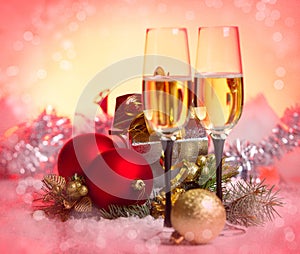 New Year and Christmas Celebration .Two Champagne Glasses in Holiday decoration.