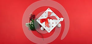 New year and christmas composition, banner with gift box and beautiful branch