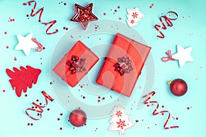 New Year and Christmas composition. Red and white christmas decorations -gift boxes, stars, christmas tree, christmas balls, Santa