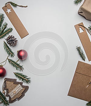 New Year or Christmas concept of gift wrapping, paper, envelopes, Christmas tree branches, on a white background, place for text