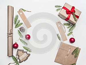 New Year or Christmas concept gift wrapping, paper, envelopes, Christmas tree branches, on a white background, place for text f