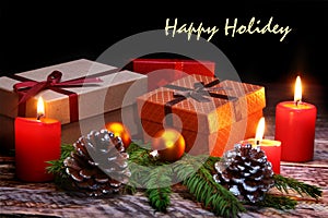 New Year or Christmas decorations with gift boxes, candles and balls. greeting card. Happy holidey.