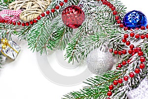 New Year and Christmas decorations with green fir tree branches and Xmas traditional decor with copy space for greeting invitation