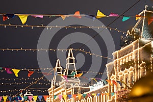 New year and Christmas fair on the Red Square in Moscow. Festive decor. Christmas decoration and shining G.U.M. central