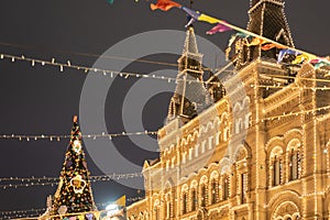 New year and Christmas fair on the Red Square in Moscow. Festive decor. Christmas decoration and shining G.U.M. central