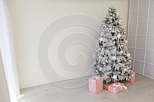 New year Christmas tree holiday gifts white interior winter decor