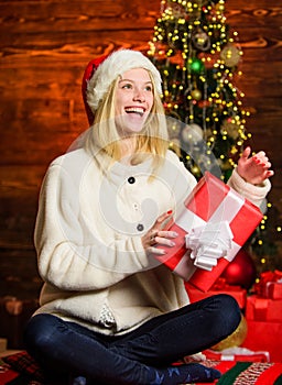 New year is coming. Happy smiling woman and gift box. Happy moments. Happiness and joy. Thrilling emotions. Merry
