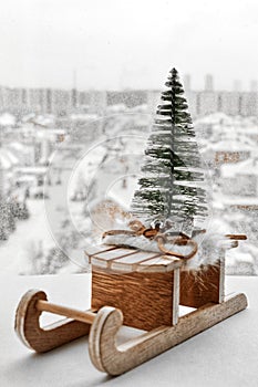 New year composition, Christmas tree on wooden sleigh