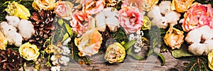 New Year composition of flowers, gifts on a wooden table. Christmas background. Flat lay.Top view