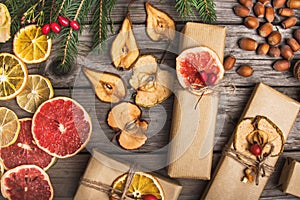 New Year composition of flowers, gifts on a wooden table. Christmas background. Flat lay.Top view