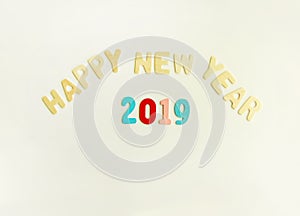 New Year composition with wooden 2019 numbers and letters. Happy New Year festive card.