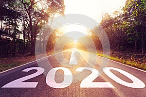 New Year Concept : Empty asphalt road sunset and New Year 2020