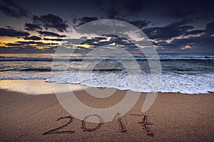 New Year 2017 concept on the sea beach