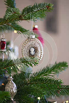 New year cozy home interior with Christmas tree and garlands. Christmas decoration in house