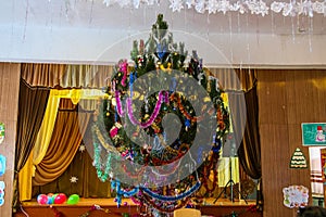 New Year decorated Christmas tree in high school