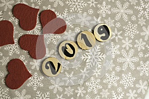 New Year decorations, red textile hearts and decorative elements. Number 2019. New Year concept.