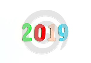 New Year decorative composition with 2019 colorful wooden small numbers. Festive card with empty space for message