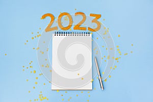 New Year empty goals, plans 2023 concept with notebook and pen. flat lay style. Christmas planning concept