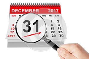 New Year Eve Concept. 31 December 2017 calendar with magnifier