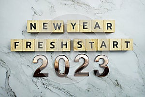 New Year Fresh Start 2023 text on marble background