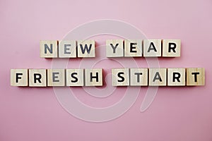 New Year Fresh Start alphabet letter on pink background