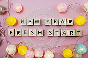 New Year Fresh Start alphabet letter on pink background