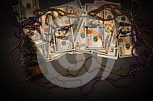 New Year and Gift. Dollars as a gift. A gift for a Christmas tree. Background economics