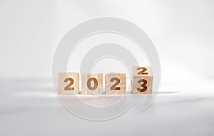 New year goals 2023, changes the number on a wooden cube. Resolutions, plan and goals, checklist concept. New Year 2023