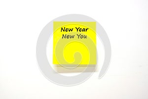 New Year New You text with stick note paper or post it on white background