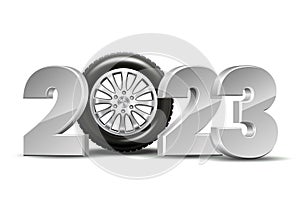 New Year numbers 2023 with car tire isolated on white background.