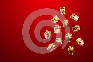 New Year\'s background, falling New Year\'s gifts with bows on a red background. Holiday concept, Christmas, gift giving