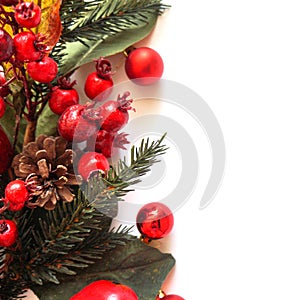 New Year`s background with a fir-tree branch, a garland and toys