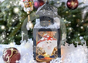 New Year`s, Christmas still life. Christmas handmade decorated lantern with a picture of fairy-tale amanita on the glass. Fir-tre