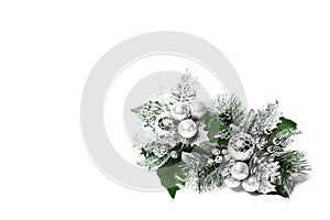 New Year`s composition. Christmas decorations, silvery spruce branches. Gift on a white isolated background