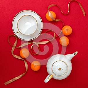 New Year's concept. New Year and Christmas. Table with kettle, cup and spruce branch. Festive concept. Top