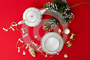 New Year's concept. New Year and Christmas. Table with kettle, cup and spruce branch. Festive concept. Top