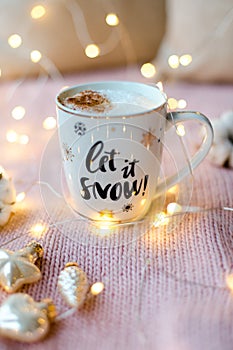 New Year`s cup of cappuccino with cinnamon