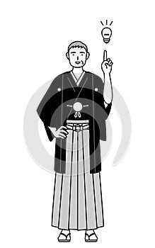 New Year\'s Day and weddings, Senior man wearing Hakama with crest coming up with an idea