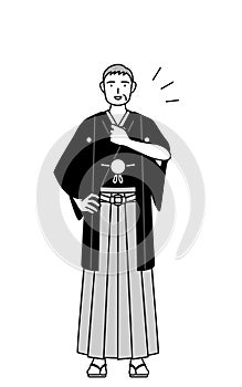 New Year\'s Day and weddings, Senior man wearing Hakama with crest tapping his chest