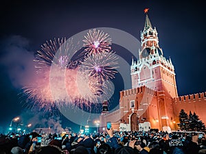 New Year`s Eve in Moscow. Fireworks on Red Square near the Spasskaya Tower on New Year`s Eve. Multicolored salute in the