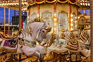 New Year`s festive empty carousel with festive illumination. Close-up