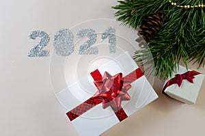 New Year`s gift under the Christmas tree. New Year`s Eve 2021