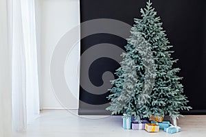 New Year`s Happy Christmas Tree decor presents interior postcard