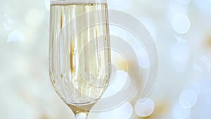 New Year`s holidays. A glass of champagne, a toast from the first person