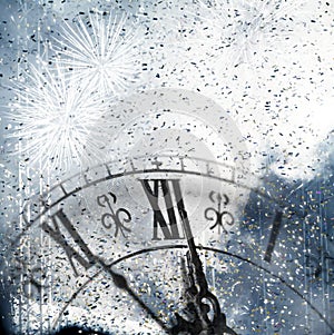 New Year's at midnight - Old clock and holiday lights