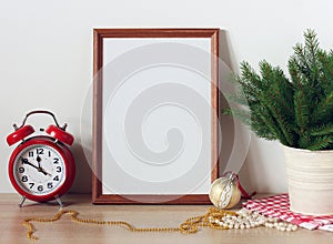 New Year`s mock up with an empty frame Christmas festive backdrop