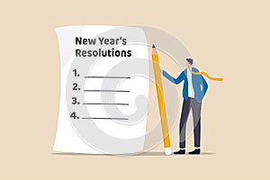 New year`s resolutions, set goal or business target for new year or beginning with work challenge concept, smart businessman