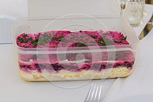 New Year's salad layered with mayonnaise.