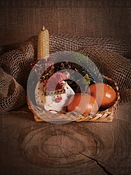 New Year`s still-life with tangerines, chocolate and a fur-tree branch